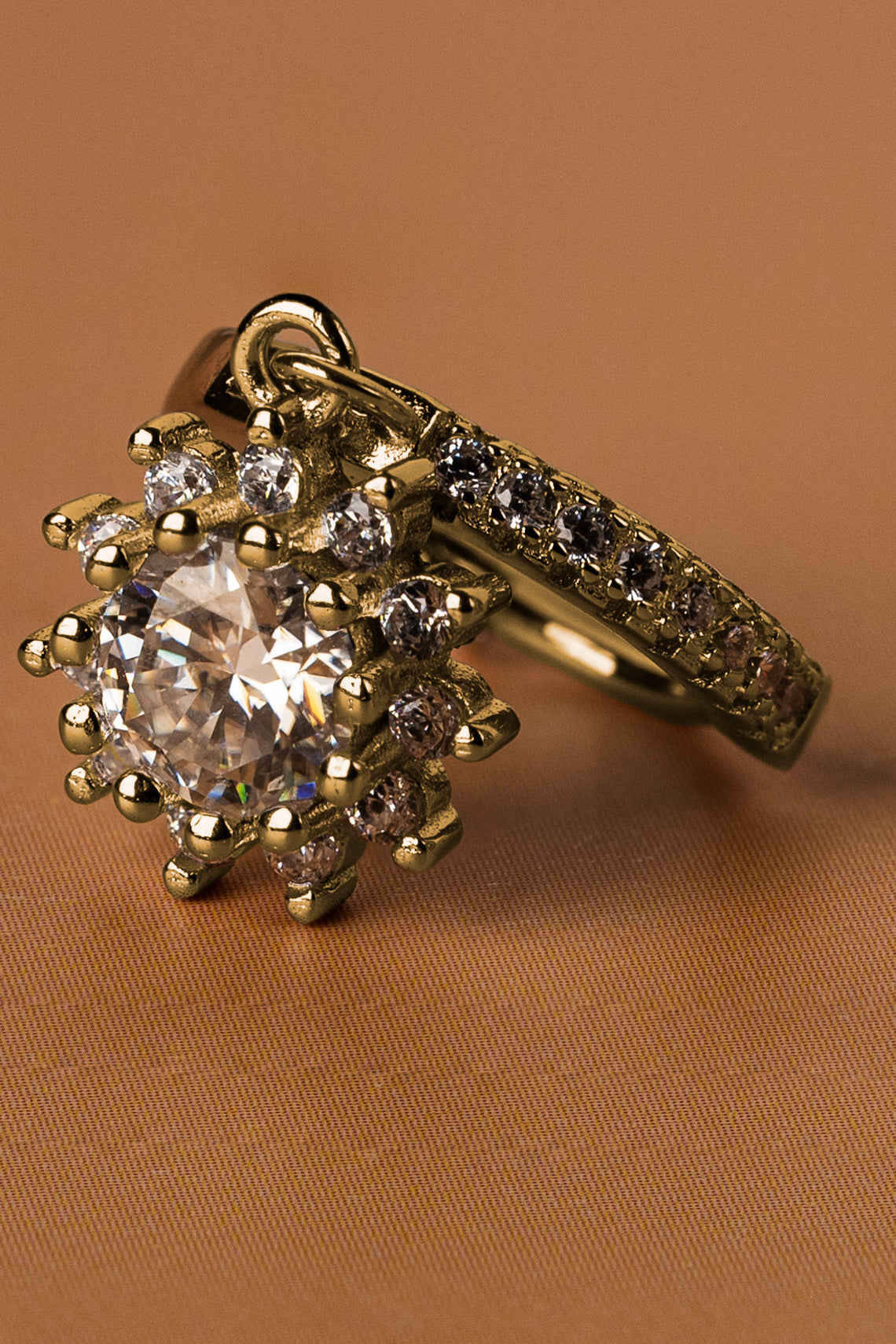 Veyelle Étoile moissanite drop earrings in golden gold — close-up