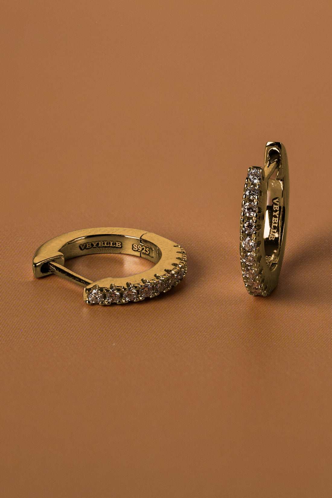 Veyelle Auris moissanite huggie earrings in white gold