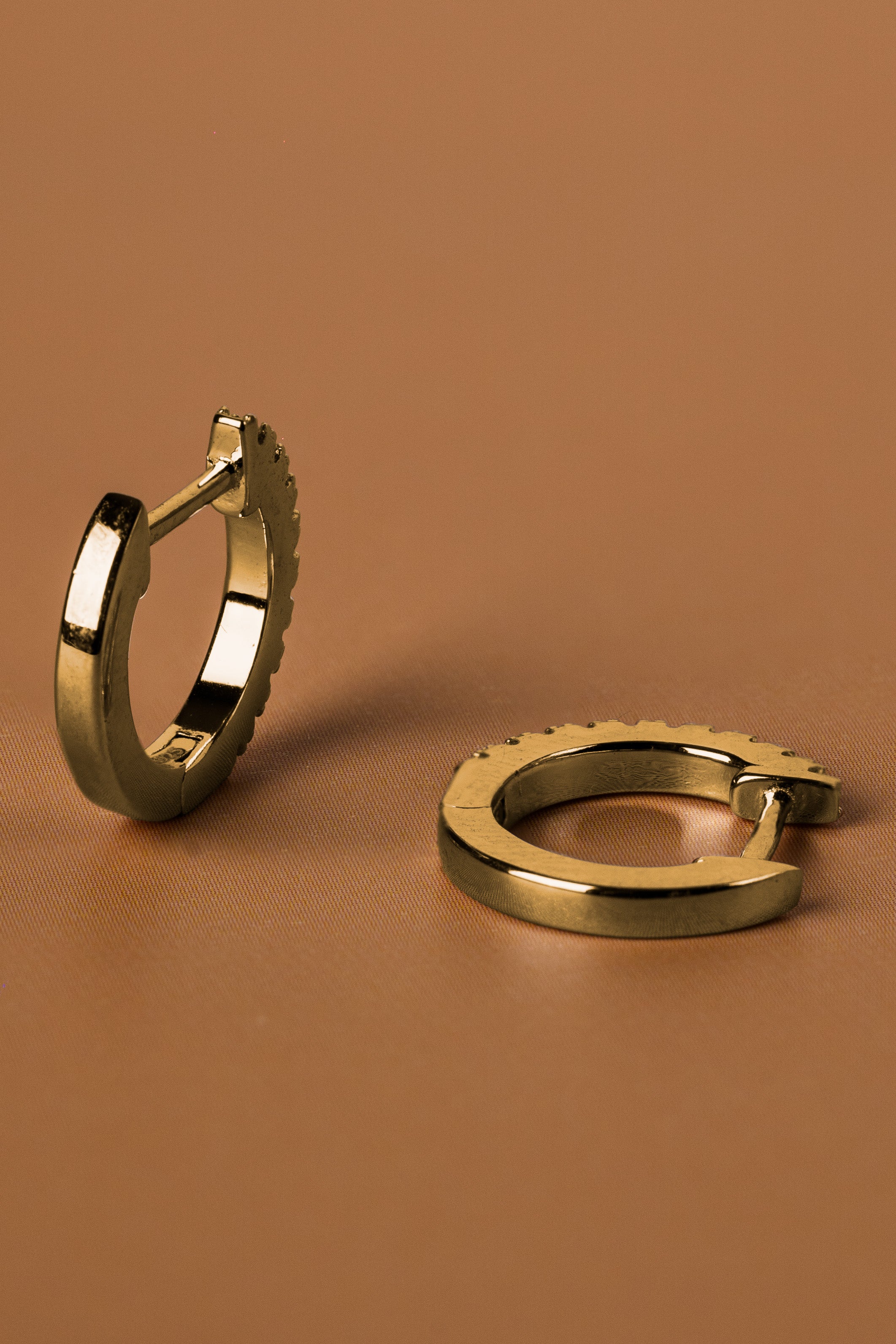 Veyelle Auris moissanite huggie earrings in golden gold — back shot
