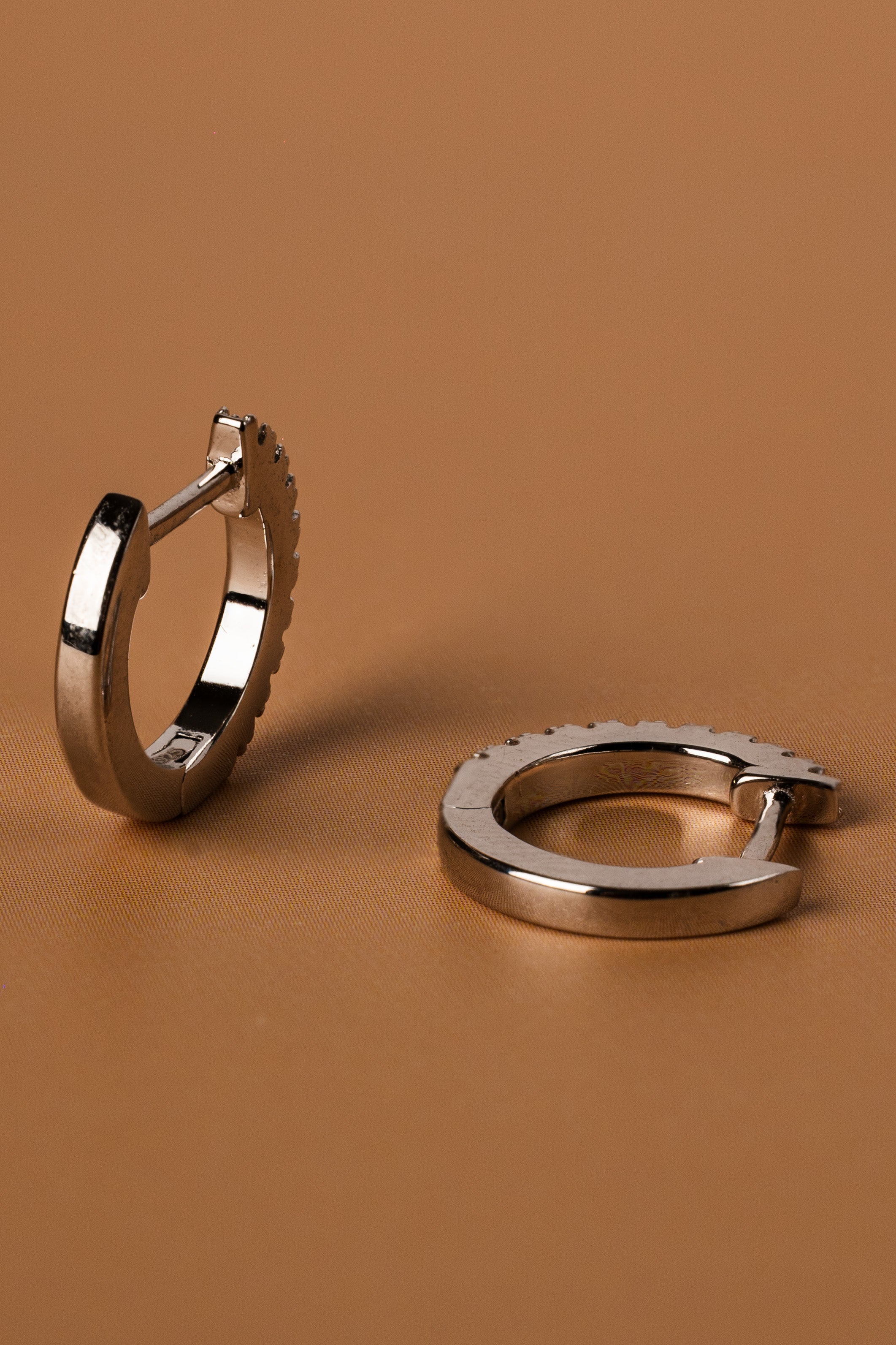 Veyelle Auris moissanite huggie earrings in white gold — back shot