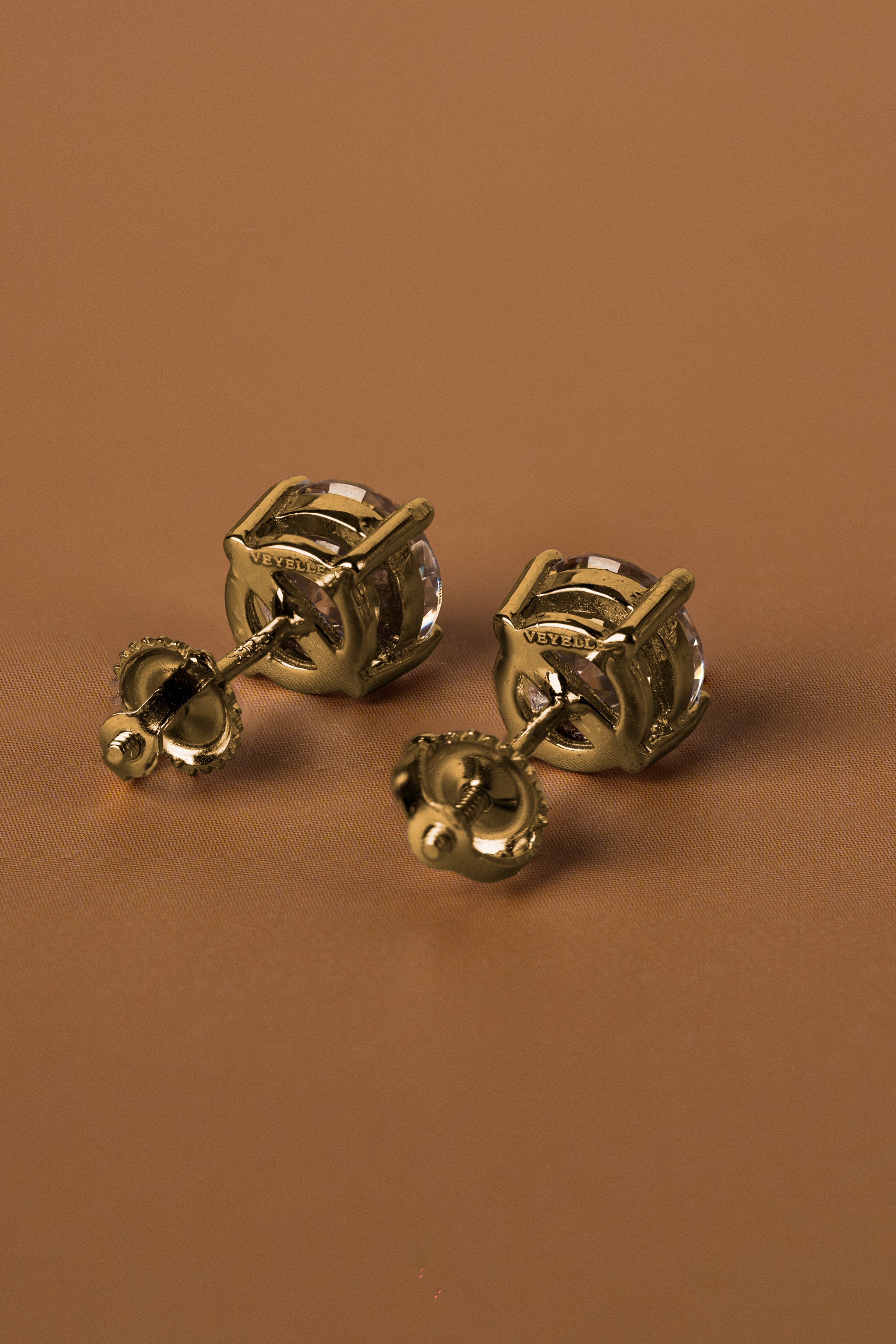 Veyelle Pura moissanite stud earrings in golden gold — back shot