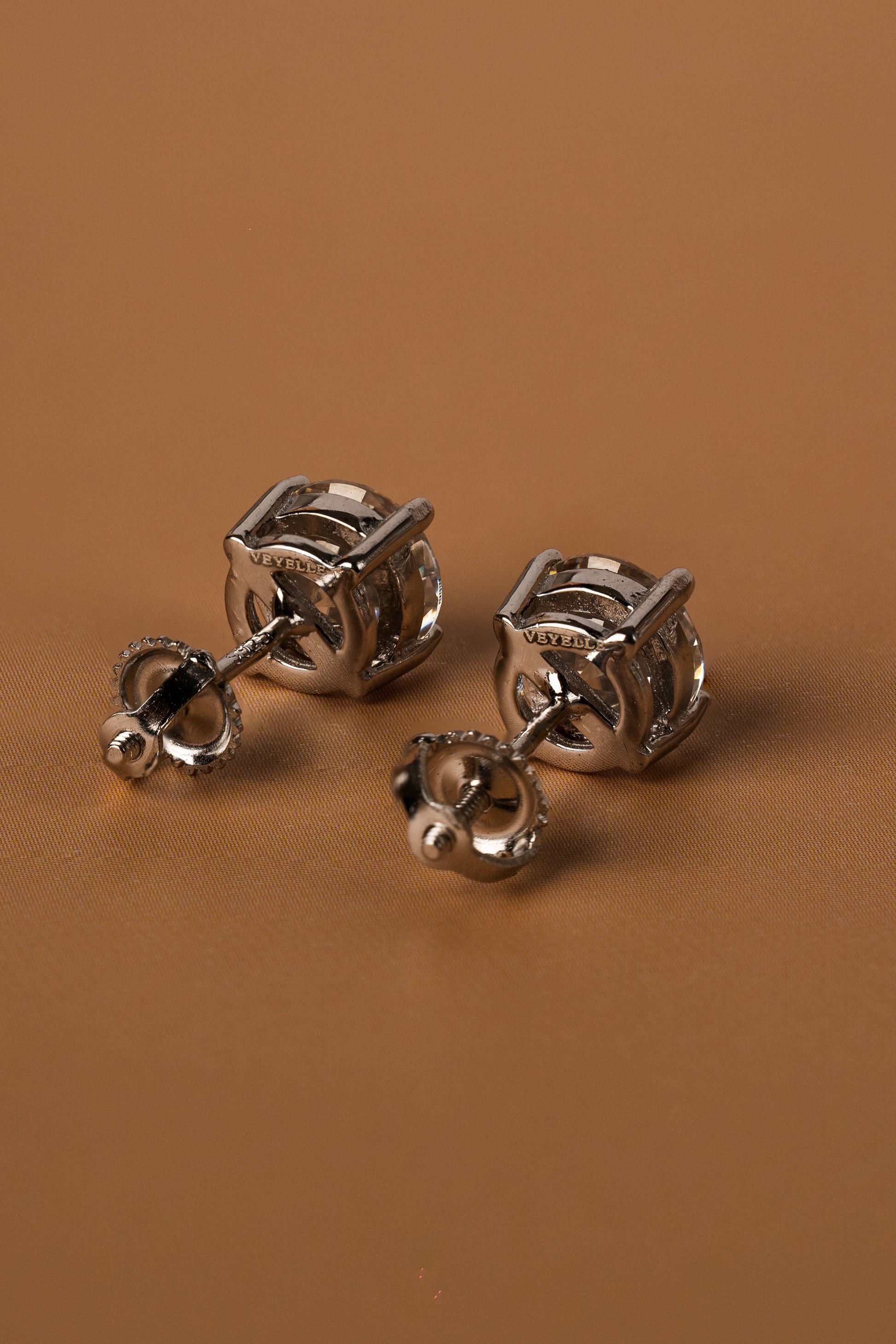 Veyelle Pura moissanite stud earrings in white gold — back shot