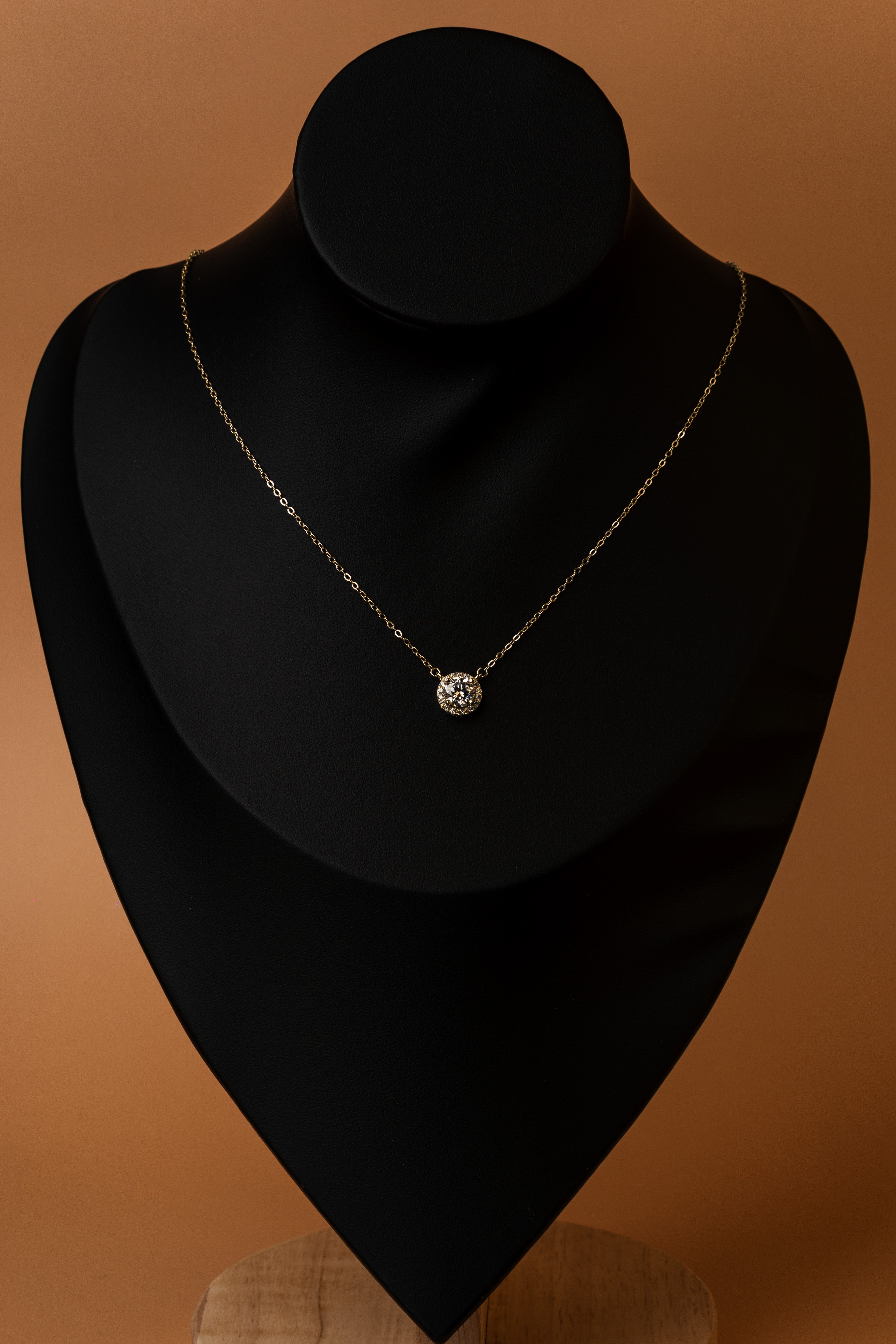 Veyelle Lumière moissanite station necklace in golden gold — on model