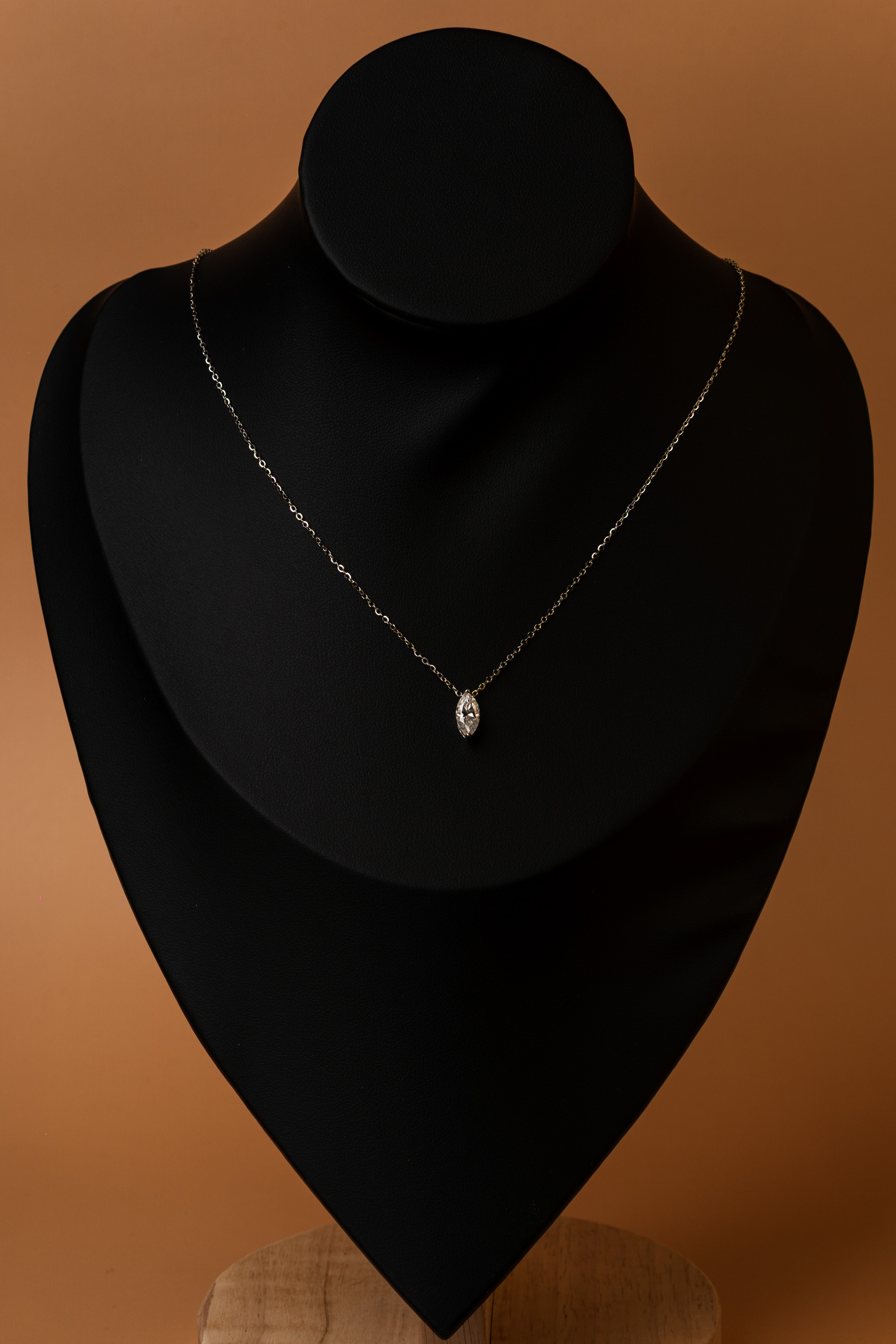 Veyelle Sylvie moissanite pendant necklace in golden gold — on model