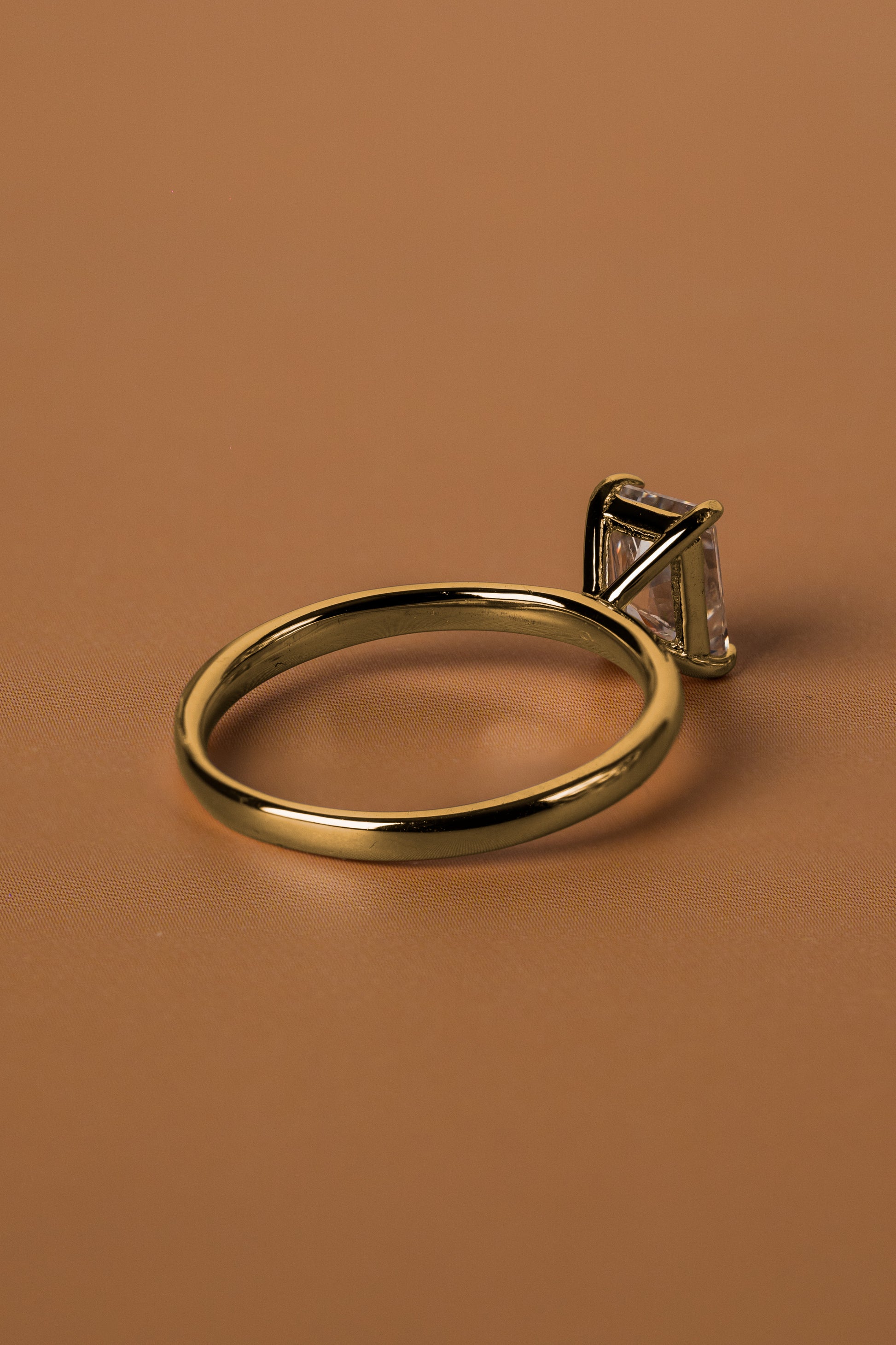 Veyelle Taille moissanite radiant ring in golden gold — back shot