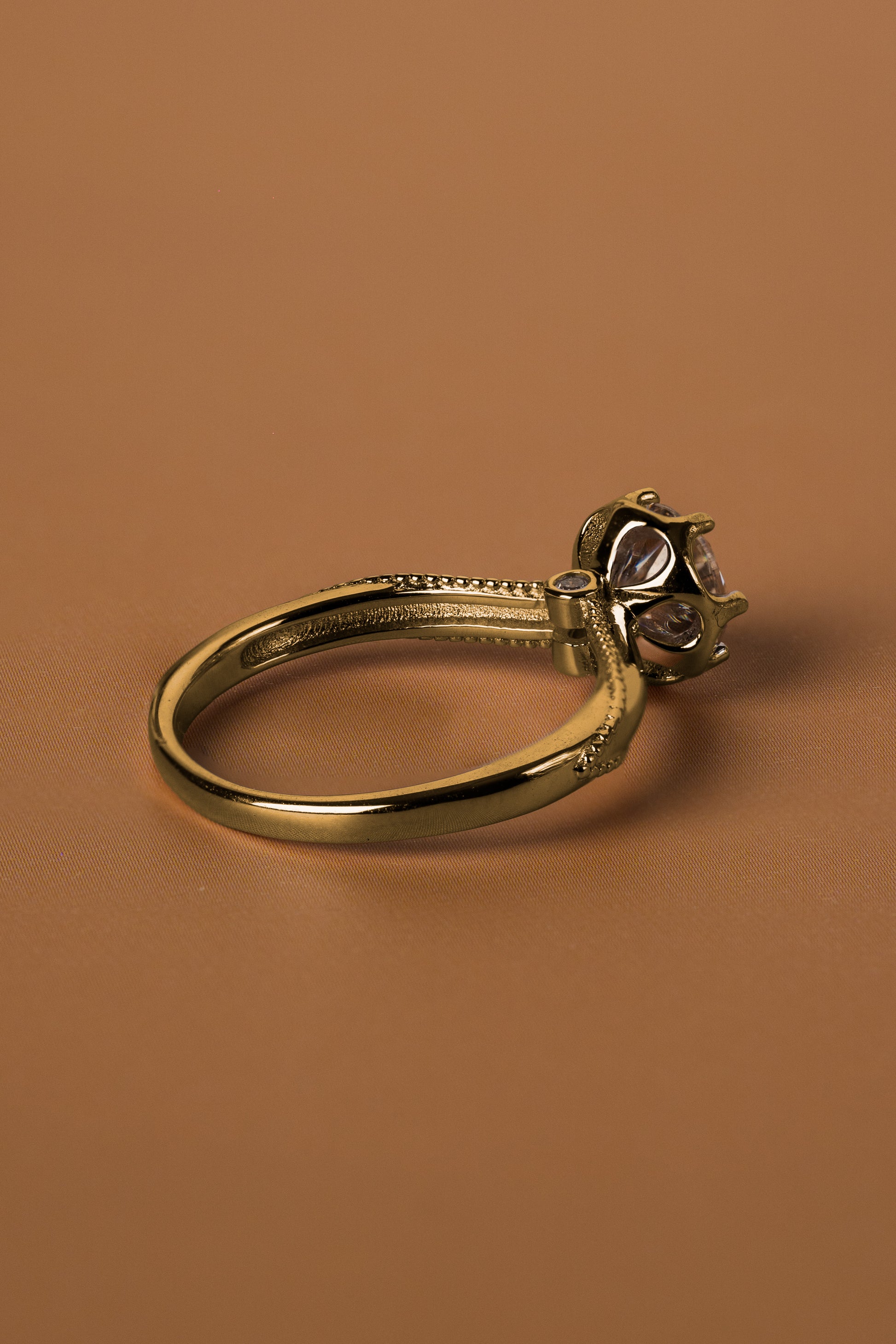 Veyelle Borde moissanite milgrain ring in golden gold — back shot