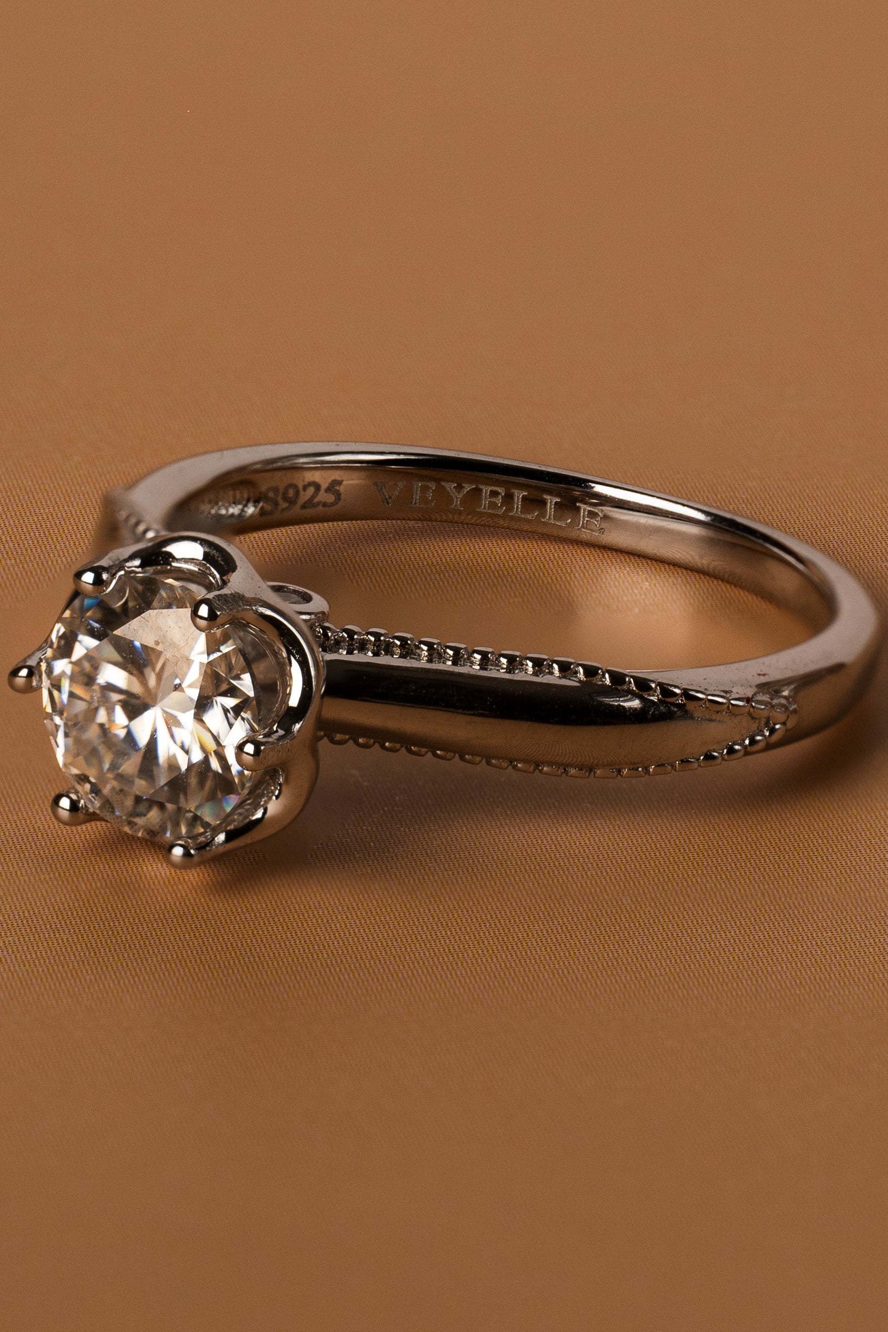 Veyelle Borde moissanite milgrain ring in white gold — close-up